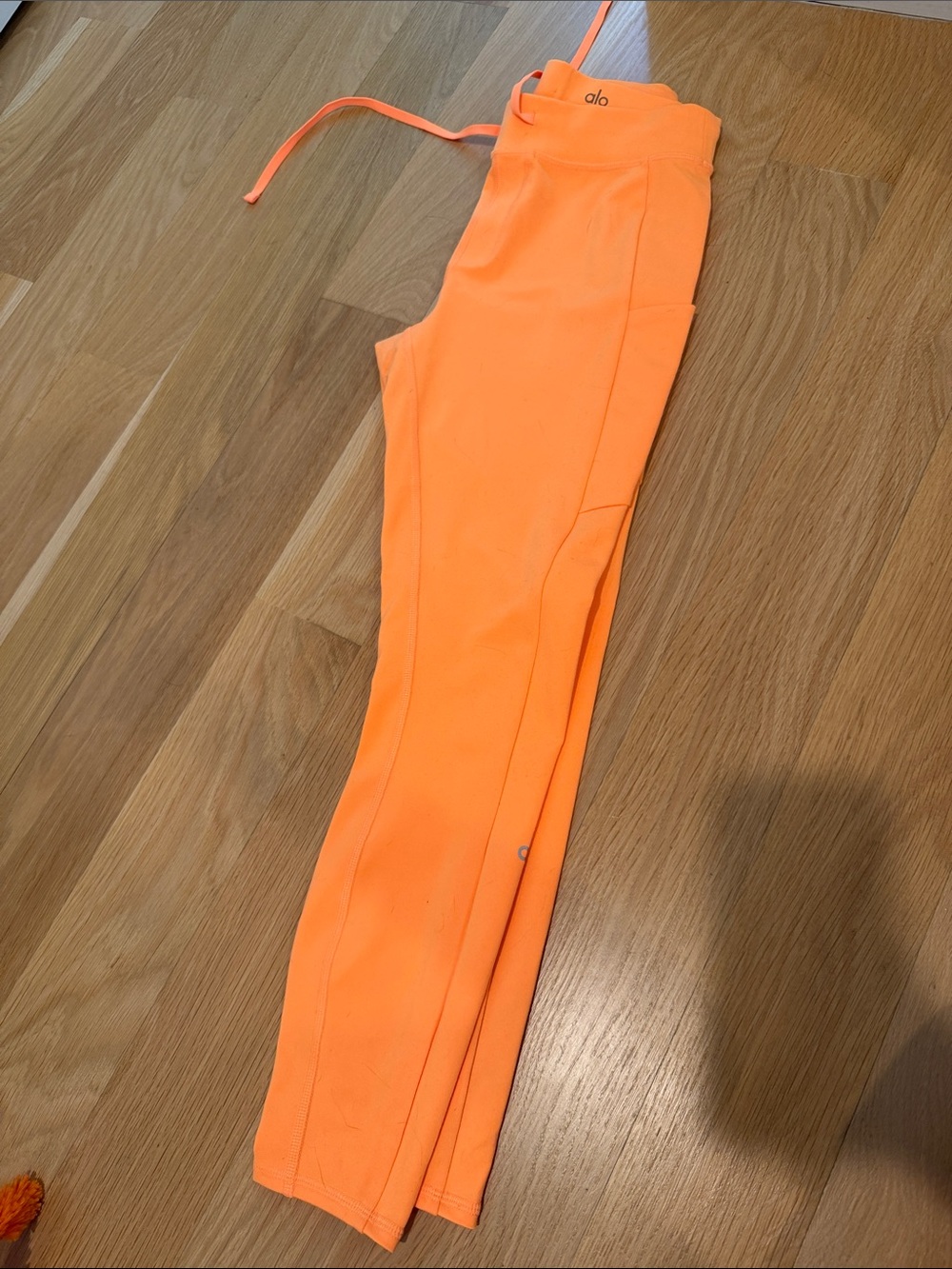 ALO Yoga Orange yoga pants with pockets